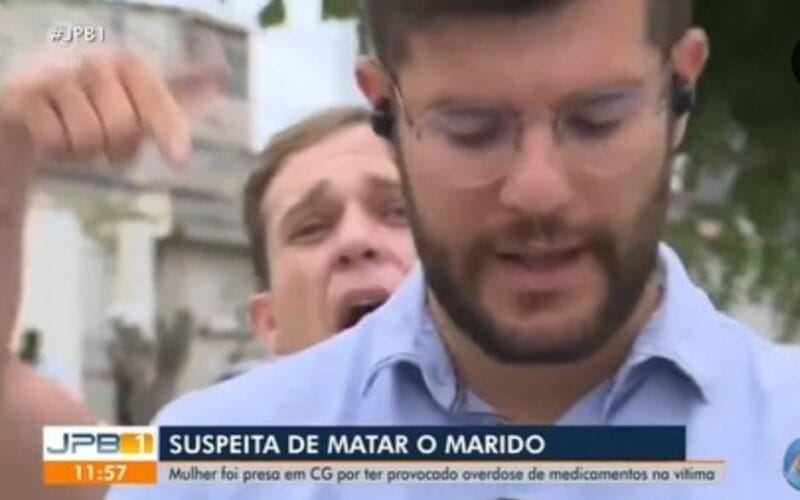 Homem interrompe reportagem ao vivo para dizer que a Globo é uma merda